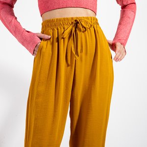 Желтые женские брюки