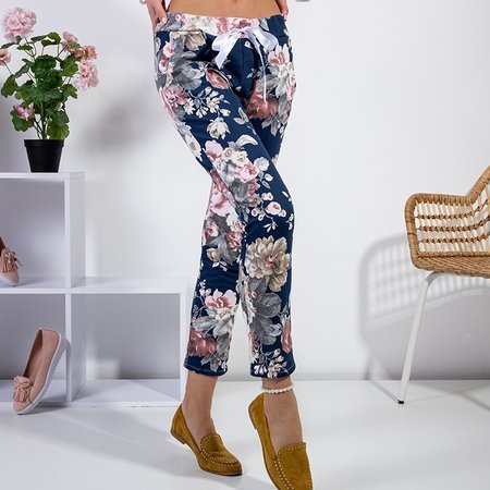 Різнокольорові жіночі штани з квітковим принтом
