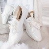 Біле взуття з лакованої екошкіри Юта - Взуття