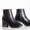 Чорні черевики на каблуці, що прикрашений зміїним принтом Rossana - Взуття