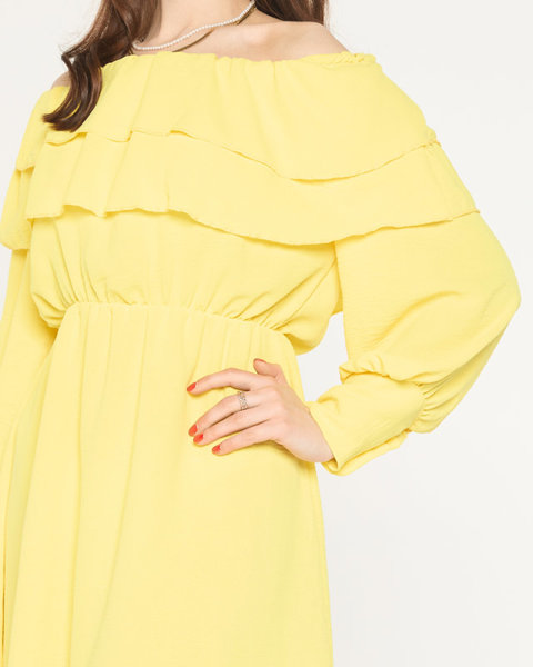Жовта сукня з оборками